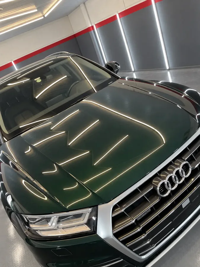 SUV verde con pintura corregida